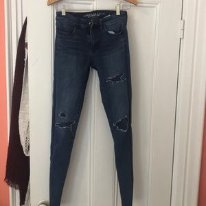 Ripped blue super stretchy jeans. Size 2 x-long